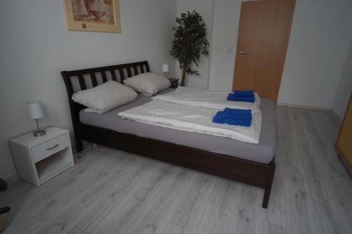 Postel nebo postele na pokoji v ubytování Heidelberg Apartments