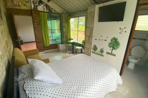 Cama o camas de una habitación en Cabaña en Parque Ecocenter