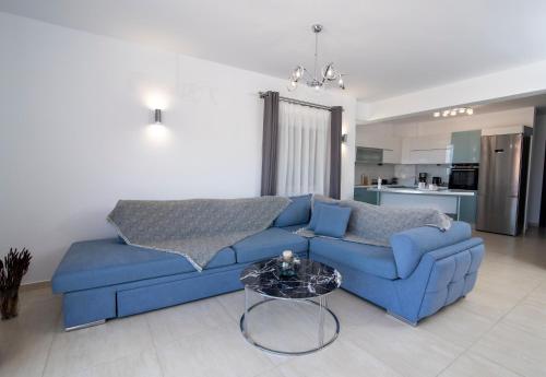 Гостиная зона в Mary's luxury apartment Elaia 1
