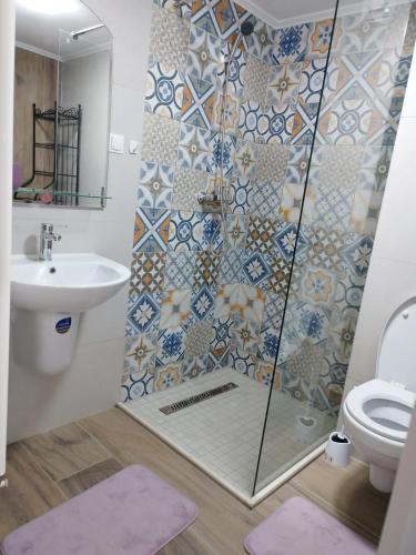 Ванная комната в Apartament ALYOSHA