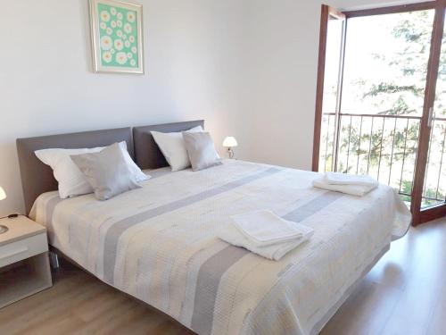 Postel nebo postele na pokoji v ubytování Apartment Silvana