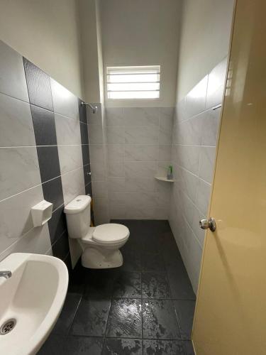 Koupelna v ubytování BUNGALOW homestay JASIN PERDANA