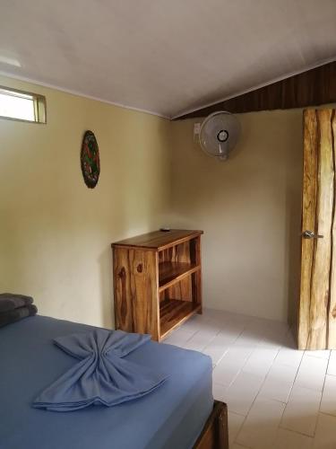 Postel nebo postele na pokoji v ubytování El Gecko Hotel & Tours