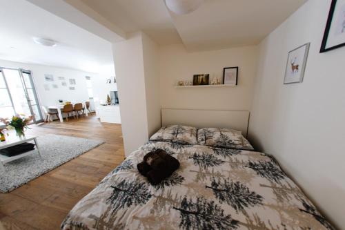 a bedroom with a bed in a room at Apartmán s nádherným výhledem v centru Harrachova in Harrachov