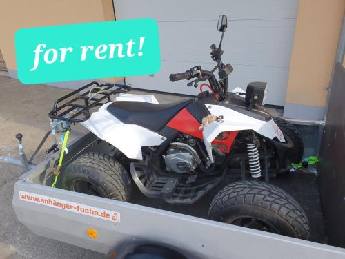 a dirt bike in a trailer with the words for rent at Jägerhaus in Nossen