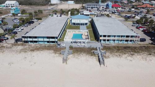 an aerial view of a building in the water at Buccaneer Inn in St. George Island