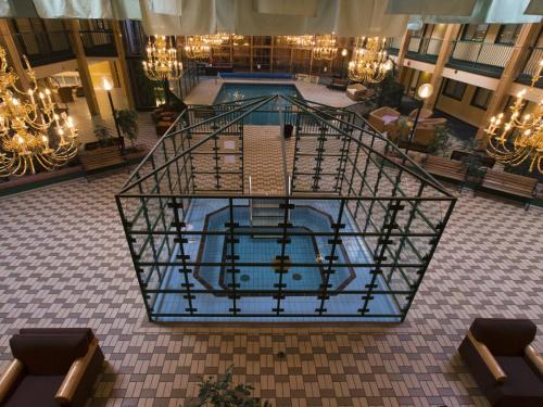 an overhead view of a pool in a building at Park Place Lodge in Fernie