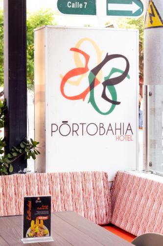 Un certificado, premio, letrero u otro documento en Hotel Portobahia Santa Marta Rodadero