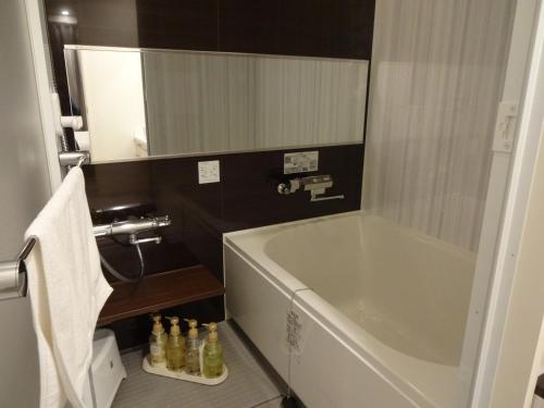 Koupelna v ubytování Amand Hotel