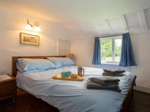 Posteľ alebo postele v izbe v ubytovaní Avebury Cottage