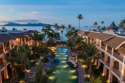 an aerial view of a resort with a swimming pool at Holiday Inn Resort Samui Bophut Beach by IHG in Bophut 