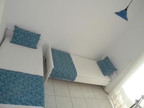 Ένα ή περισσότερα κρεβάτια σε δωμάτιο στο Vassilikos Apartment
