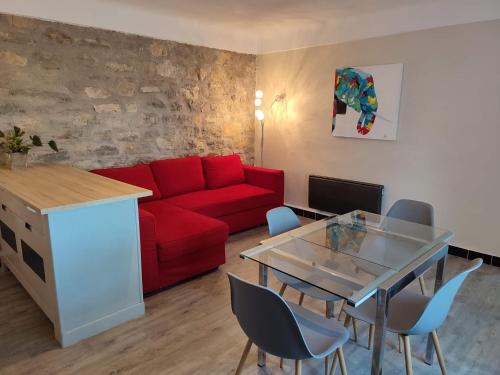 Posedenie v ubytovaní Auberge des Espérels Rez de maison avec Jardin