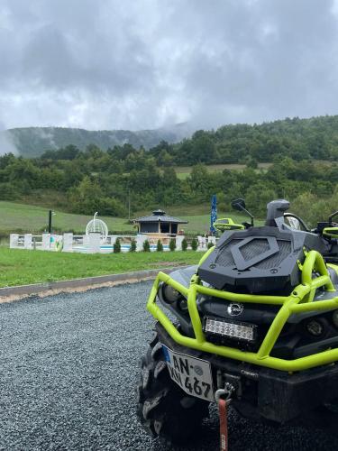 an atv parked on the side of a road at Etno Selo RELAX in Šipovo