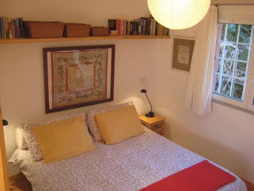 מיטה או מיטות בחדר ב-Belvedere Lodge