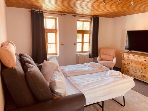 Postel nebo postele na pokoji v ubytování Ferienwohnung Till Eulenspiegel
