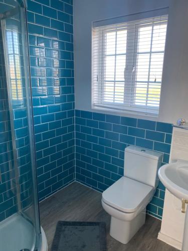 Kúpeľňa v ubytovaní Holiday house within 5 min walk from Bracklesham Bay beach