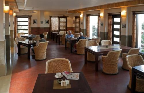 Coin salon dans l'établissement Atithi Guest House