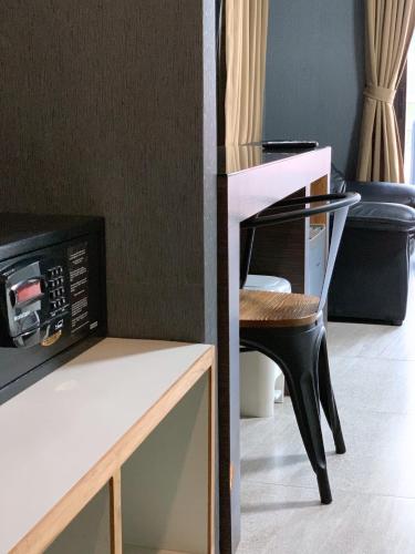 TV a/nebo společenská místnost v ubytování Watana Hotel