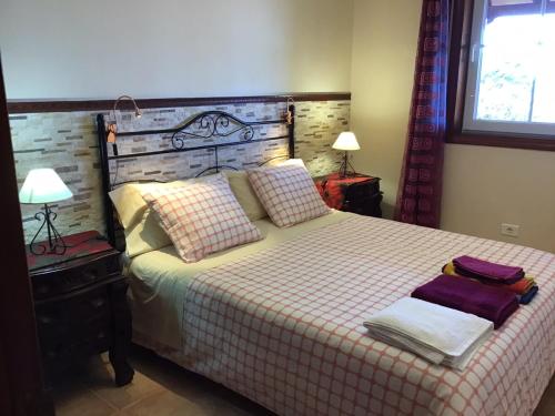 Una cama o camas en una habitación de CASA Mar y Teide