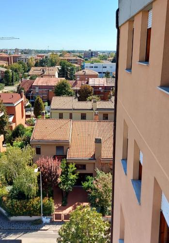 a view of a city from a building at Il sole in Carpi