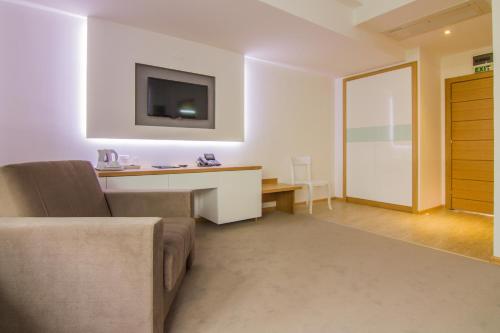 Un lugar para sentarse en Gardenia Hotel & Spa