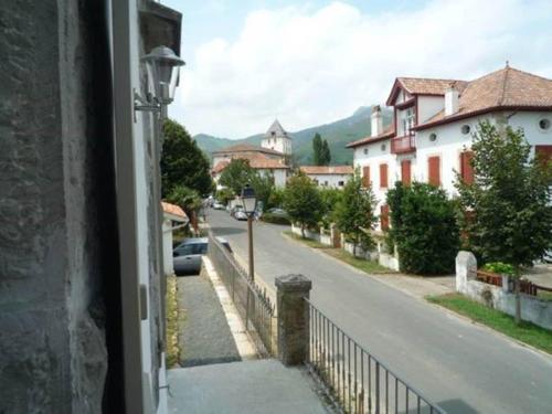 a view from a window of a street with houses at Chalet Elisa Chambre d'Hôtes in Sare