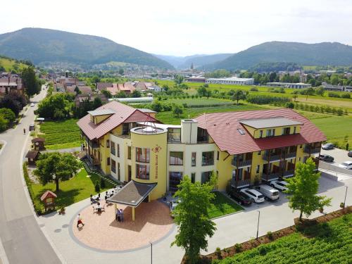 an overhead view of a building in a town at Mosers Blume Relax & Genuss Hotel in Haslach im Kinzigtal
