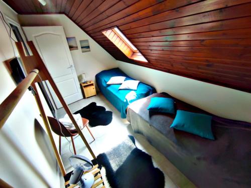 a small room with a bed and a couch at Alea Apartmanok in Harkány