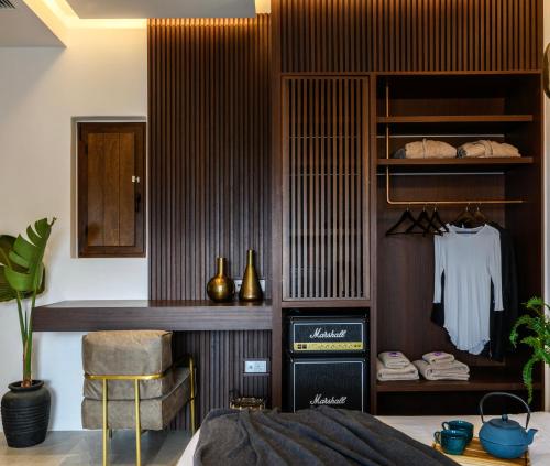 Ένα ή περισσότερα κρεβάτια σε δωμάτιο στο Charisma Hotel and Wellness Club