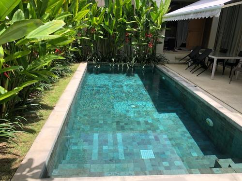 Kolam renang di atau dekat dengan Superbe villa tropicale avec piscine privée Phuket