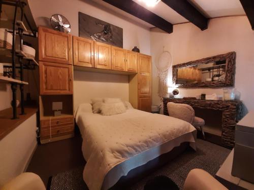 מיטה או מיטות בחדר ב-La Singlantane