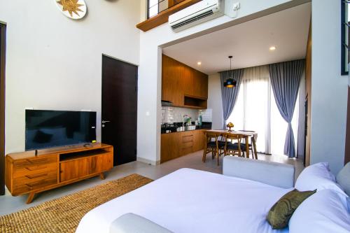 Ένα ή περισσότερα κρεβάτια σε δωμάτιο στο De Hsahe Villas