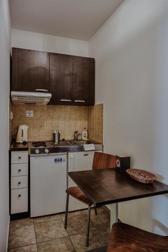 Η κουζίνα ή μικρή κουζίνα στο Apartmany Gino Besenova