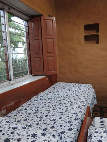 Cama o camas de una habitación en Dinesh House