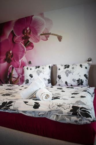 Una cama o camas en una habitación de Hostinec a penzion U sv. Mikuláše