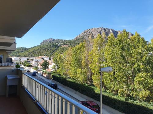 a balcony with a view of a mountain at Payet Apartments in L'Estartit