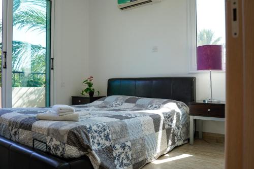 Ένα ή περισσότερα κρεβάτια σε δωμάτιο στο Villa Sirena, Pernera, Valentino