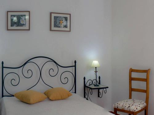 Quinta da Fonte do Lugar tesisinde bir odada yatak veya yataklar