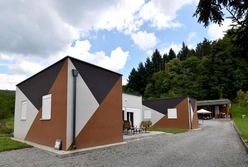 a building with a geometric design on the side of it at Kuća za odmor GRAŠEVINA in Kutjevo