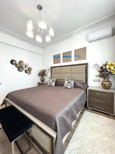Giường trong phòng chung tại Sky View - Luxury Apartament - Sanador Victoriei