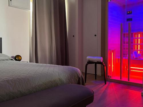 Posteľ alebo postele v izbe v ubytovaní CASA ENEA TERRACINA - Relax Sauna Apartment