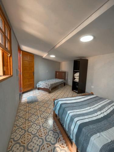 Un pat sau paturi într-o cameră la Chácara Águas São Pedro