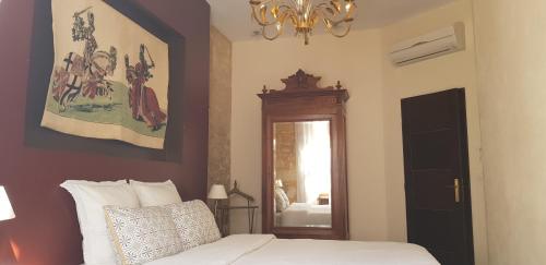 Ένα ή περισσότερα κρεβάτια σε δωμάτιο στο Appartement Le Cardinal