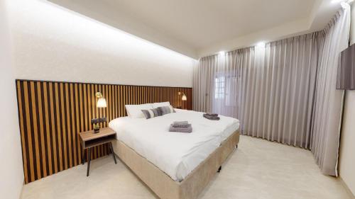Postel nebo postele na pokoji v ubytování A luxury apartment in the center of Jerusalem
