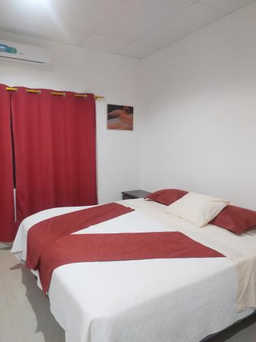Katil atau katil-katil dalam bilik di Hostal Los Flamencos