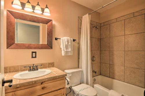 a bathroom with a sink and a toilet and a shower at Less Than 1 Mi to Brian Head Resort Mtn-View Gem with Deck in Brian Head