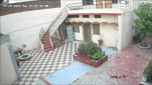 Balkón nebo terasa v ubytování GANESH GUEST HOUSE