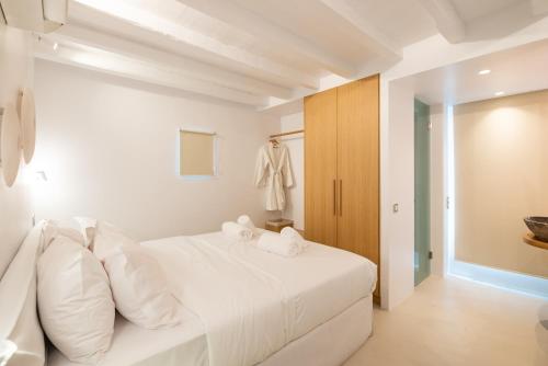 Ένα ή περισσότερα κρεβάτια σε δωμάτιο στο Villa Nima