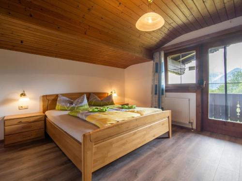 Una cama o camas en una habitación de Chalet Rosa